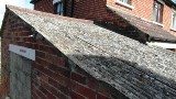 Asbestos roof covering 